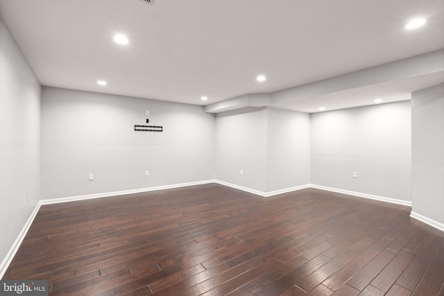 32 Beau Ridge Dr, Stafford, VA 22556 - below grade area with dark wood-style flooring, recessed lighting, and baseboards