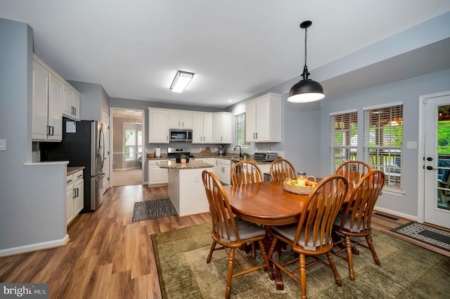 32 Beau Ridge Dr, Stafford, VA 22556 - dining area featuring wood finished floors, healthy amount of natural light, and baseboards