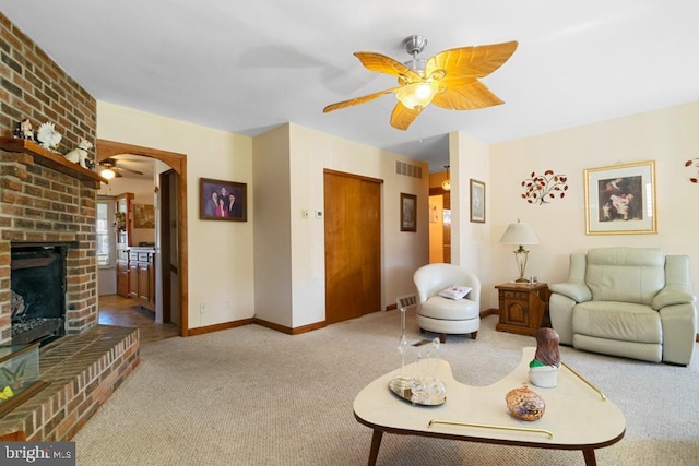 carpeted living room with a ceiling fan, arched walkways, baseboards, and a brick fireplace
