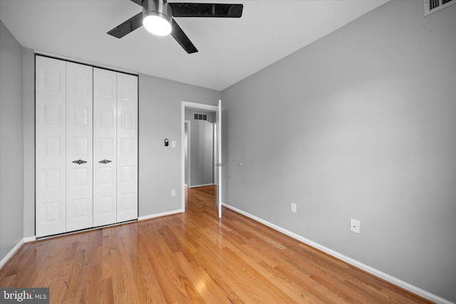 4559 Airlie Way, Annandale, VA 22003 - unfurnished bedroom featuring baseboards, light wood finished floors, a closet, and a ceiling fan