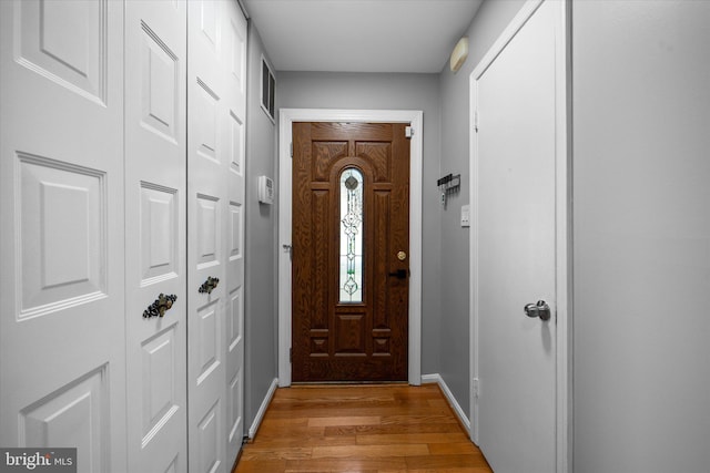 4559 Airlie Way, Annandale, VA 22003 - doorway featuring light wood-style flooring and baseboards