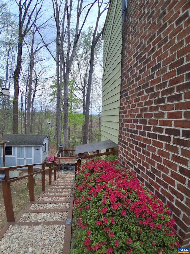 wooden deck with an outdoor structure