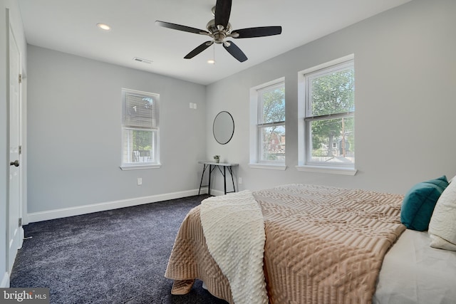 bedroom with dark carpet, baseboards, recessed lighting, and a ceiling fan