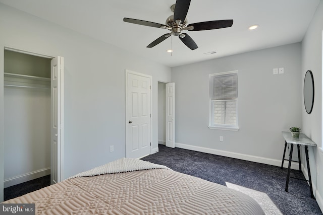 unfurnished bedroom with dark carpet, baseboards, ceiling fan, and recessed lighting