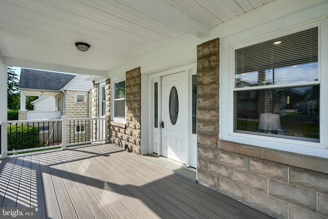 deck featuring covered porch