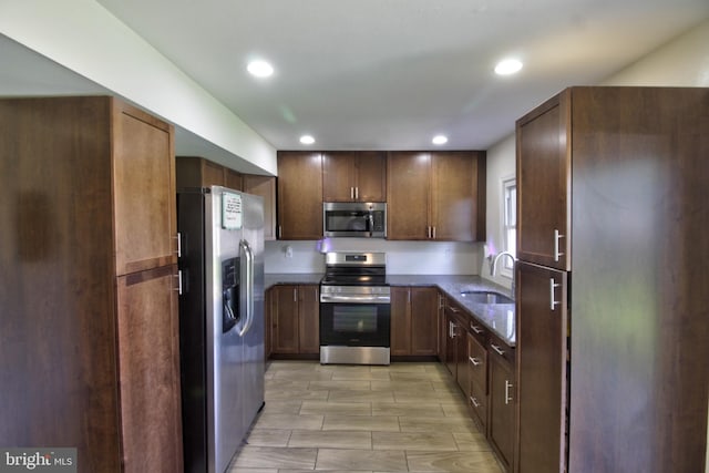 5 Middleton Ln, Willingboro, NJ 08046 - kitchen with appliances with stainless steel finishes, a sink, dark stone countertops, and recessed lighting