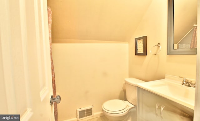 5 Middleton Ln, Willingboro, NJ 08046 - bathroom with toilet, tile patterned floors, vanity, and vaulted ceiling