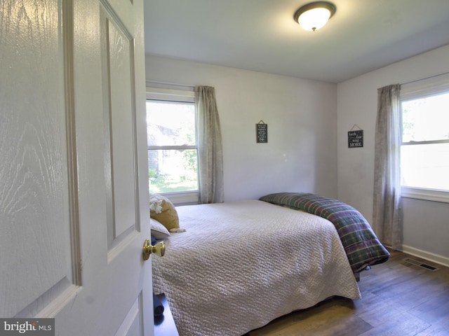 5 Middleton Ln, Willingboro, NJ 08046 - bedroom with multiple windows, wood finished floors, and baseboards