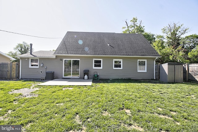 5 Middleton Ln, Willingboro, NJ 08046 - back of property featuring a patio, a storage shed, central AC unit, and an outbuilding