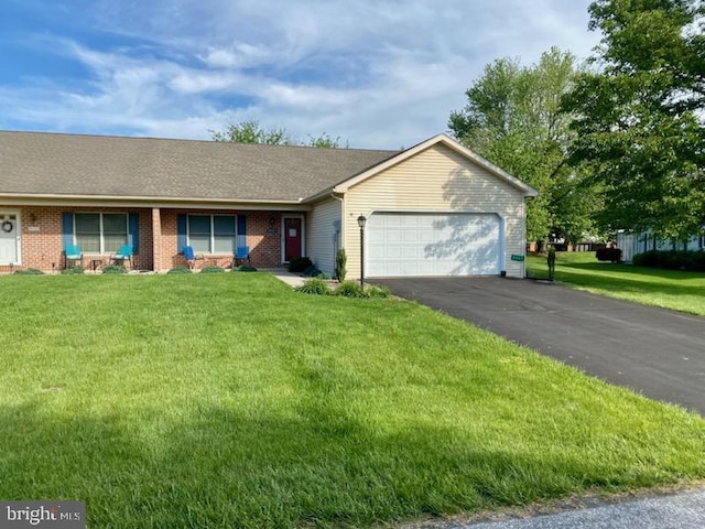 3467 Gleneagles Dr, Chambersburg, PA 17202 - ranch-style house featuring an attached garage, a front yard, brick siding, and asphalt driveway