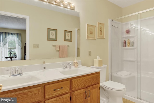 3467 Gleneagles Dr, Chambersburg, PA 17202 - bathroom with a shower stall, toilet, and double vanity
