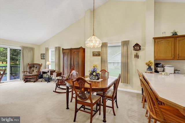 3467 Gleneagles Dr, Chambersburg, PA 17202 - dining room featuring high vaulted ceiling, a chandelier, light carpet, and baseboards