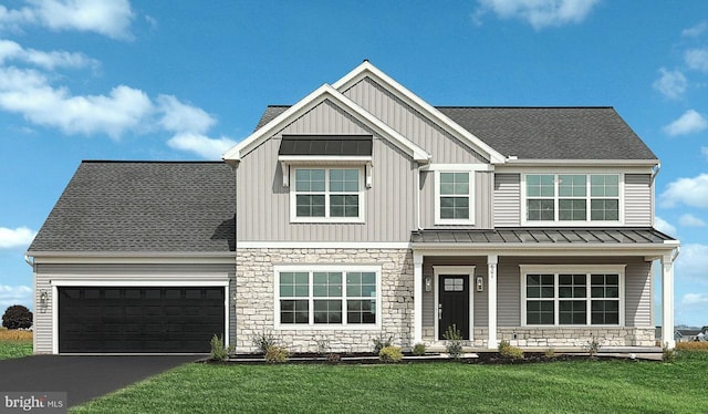 416 Allegheny Dr, Mechanicsburg, PA 17055 - view of front of house with stone siding, a standing seam roof, driveway, and a front lawn
