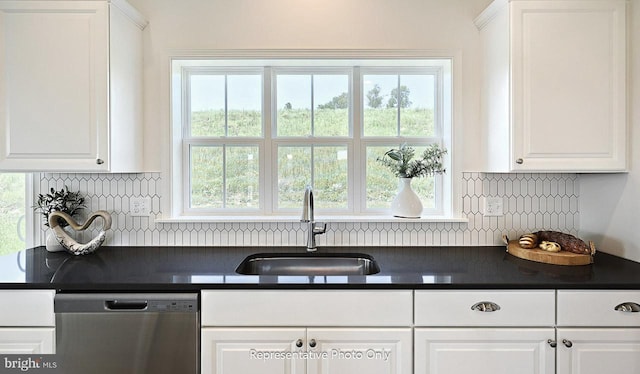 416 Allegheny Dr, Mechanicsburg, PA 17055 - kitchen with dishwasher, a sink, dark countertops, and white cabinetry