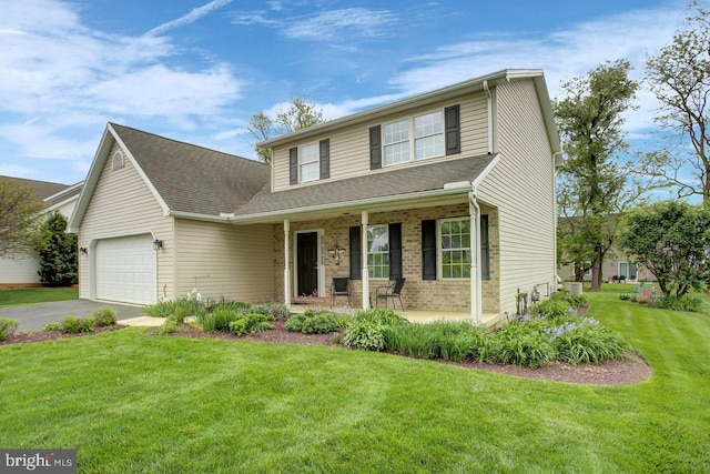 traditional-style home featuring covered porch, a garage, driveway, a front yard, and a shingled roof