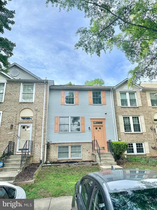 multi unit property featuring brick siding