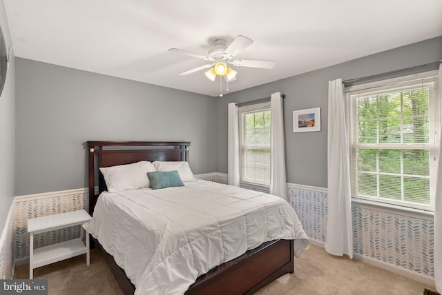 bedroom featuring carpet floors and a ceiling fan
