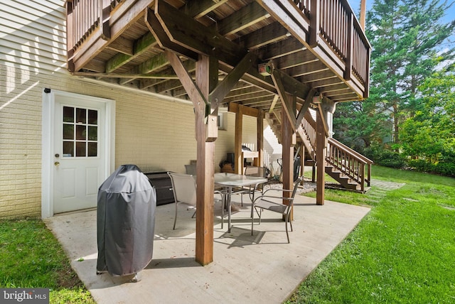view of patio / terrace with stairs and outdoor dining area