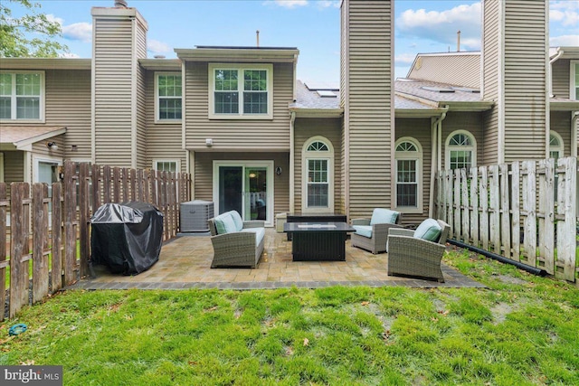 52 Kettlebrook Dr, Mount Laurel, NJ 08054 - rear view of house with an outdoor living space, a patio area, a chimney, and cooling unit