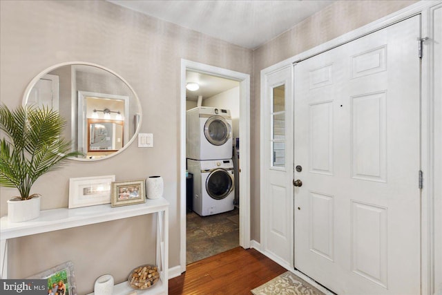 52 Kettlebrook Dr, Mount Laurel, NJ 08054 - laundry room featuring stacked washing machine and dryer, dark wood finished floors, and baseboards