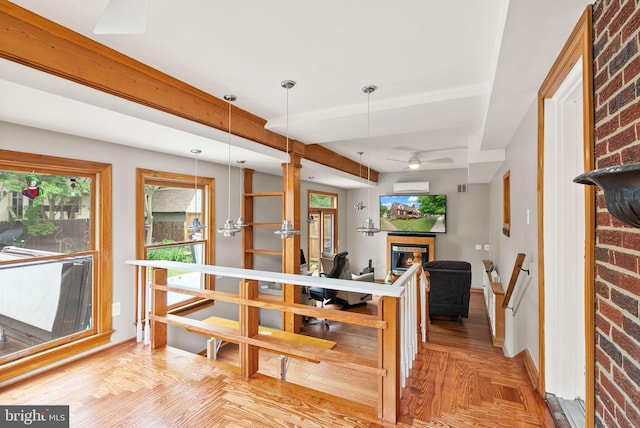 416 S Adams St, Arlington, VA 22204 - dining room featuring a glass covered fireplace, healthy amount of natural light, baseboards, and a ceiling fan