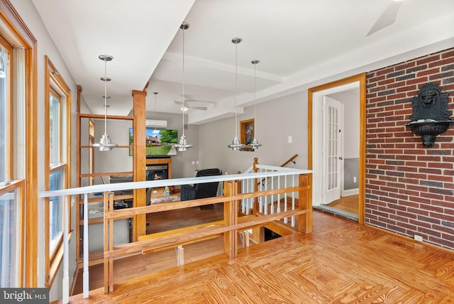 416 S Adams St, Arlington, VA 22204 - dining space with brick wall, ceiling fan, a warm lit fireplace, and parquet flooring