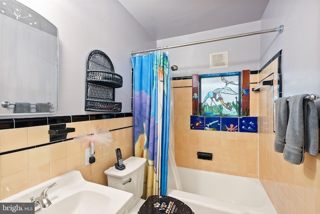 416 S Adams St, Arlington, VA 22204 - full bath featuring tile walls, a sink, shower / bath combo with shower curtain, and toilet