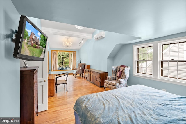 416 S Adams St, Arlington, VA 22204 - bedroom with a chandelier, wood finished floors, and a wall mounted air conditioner