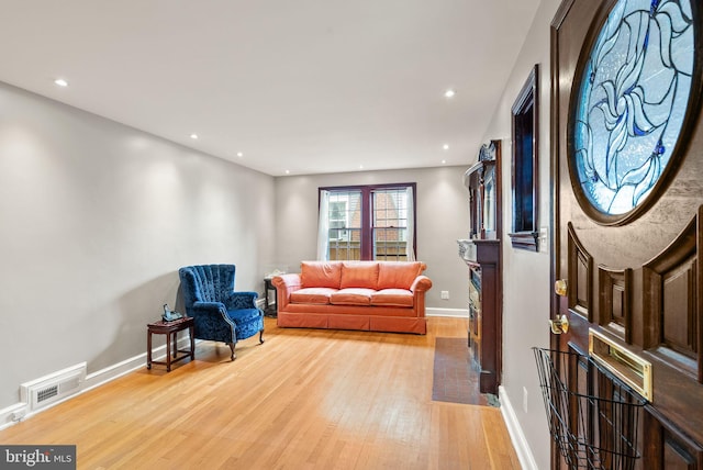 416 S Adams St, Arlington, VA 22204 - living room with light wood-type flooring, baseboards, and recessed lighting