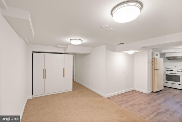 416 S Adams St, Arlington, VA 22204 - finished below grade area featuring freestanding refrigerator, baseboards, and light wood-type flooring
