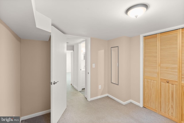 416 S Adams St, Arlington, VA 22204 - unfurnished bedroom with light carpet, baseboards, and a closet