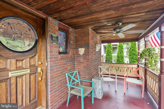 416 S Adams St, Arlington, VA 22204 - doorway to property with brick siding, a ceiling fan, and covered porch
