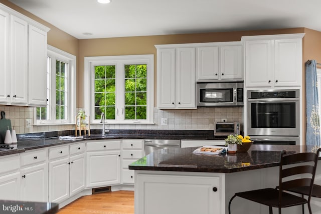10701 Monocacy Way, Manassas, VA 20112 - kitchen with stainless steel appliances, white cabinetry, and recessed lighting