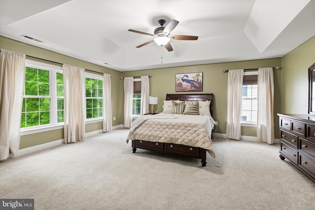 10701 Monocacy Way, Manassas, VA 20112 - bedroom featuring a raised ceiling, light carpet, baseboards, and ceiling fan