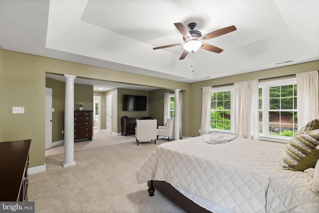 10701 Monocacy Way, Manassas, VA 20112 - bedroom featuring light carpet, baseboards, decorative columns, and a raised ceiling
