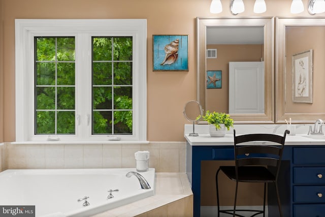 10701 Monocacy Way, Manassas, VA 20112 - full bathroom featuring healthy amount of natural light, tiled bath, and vanity