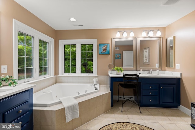 10701 Monocacy Way, Manassas, VA 20112 - full bathroom featuring vanity, tile patterned flooring, a tub with jets, and plenty of natural light