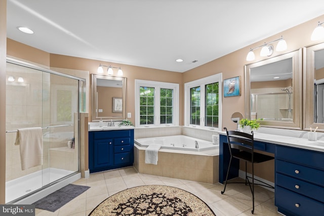 10701 Monocacy Way, Manassas, VA 20112 - bathroom with tile patterned flooring, a stall shower, vanity, a garden tub, and recessed lighting