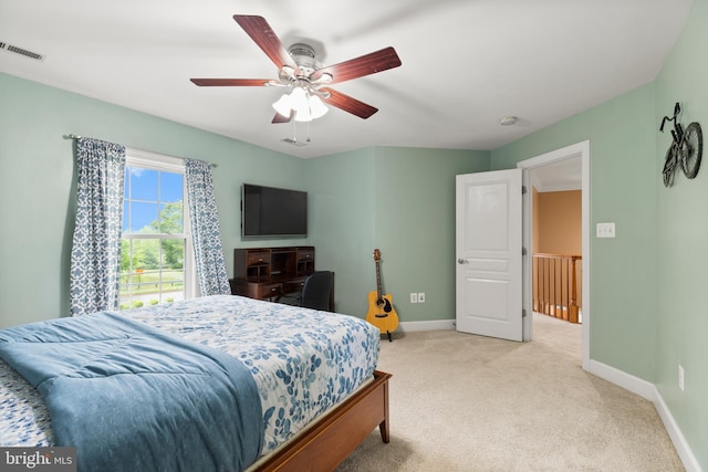 10701 Monocacy Way, Manassas, VA 20112 - bedroom with baseboards, light carpet, and ceiling fan