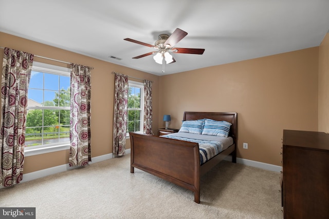 10701 Monocacy Way, Manassas, VA 20112 - bedroom featuring baseboards, light carpet, and ceiling fan
