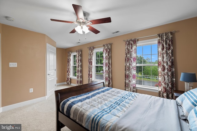 10701 Monocacy Way, Manassas, VA 20112 - carpeted bedroom with baseboards and a ceiling fan