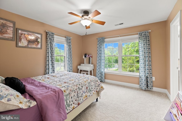 10701 Monocacy Way, Manassas, VA 20112 - carpeted bedroom featuring baseboards and a ceiling fan