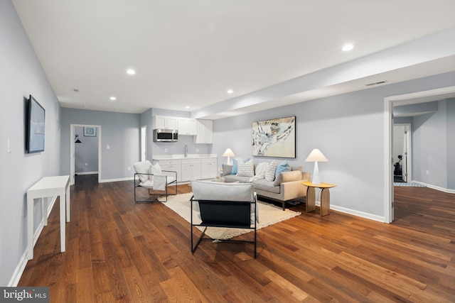 10701 Monocacy Way, Manassas, VA 20112 - living room featuring dark wood-type flooring, baseboards, and recessed lighting