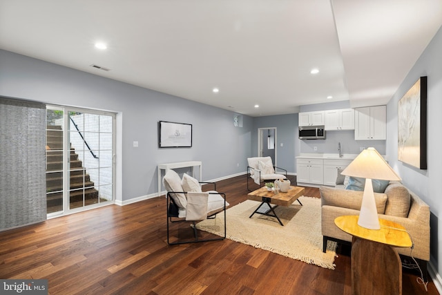 10701 Monocacy Way, Manassas, VA 20112 - living room with dark wood-style flooring, recessed lighting, and baseboards