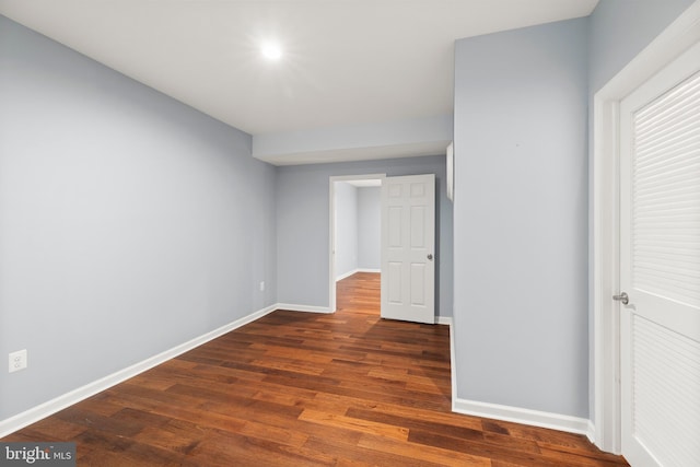 10701 Monocacy Way, Manassas, VA 20112 - unfurnished bedroom with dark wood-type flooring and baseboards