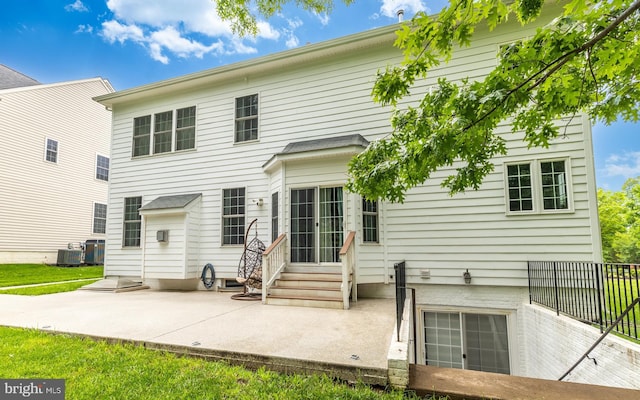 10701 Monocacy Way, Manassas, VA 20112 - rear view of property with central AC unit and a patio