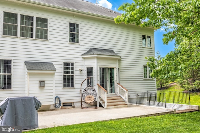 10701 Monocacy Way, Manassas, VA 20112 - rear view of property with a patio, fence, and roof with shingles