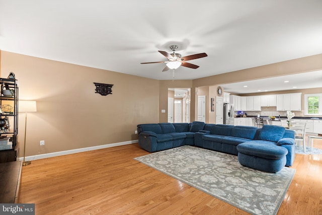 10701 Monocacy Way, Manassas, VA 20112 - living room featuring ceiling fan, baseboards, light wood finished floors, and recessed lighting