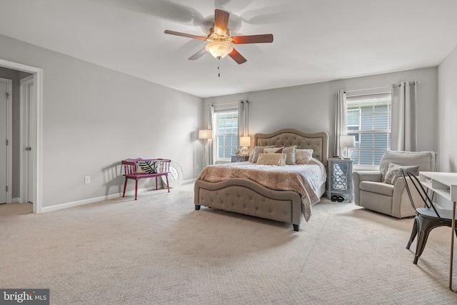 bedroom featuring carpet flooring, ceiling fan, and baseboards