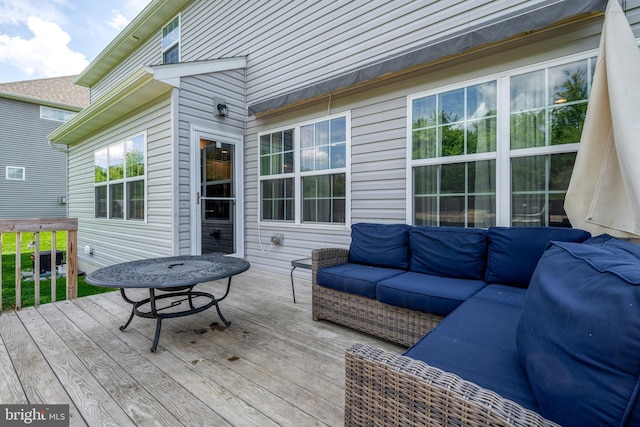 deck featuring outdoor lounge area